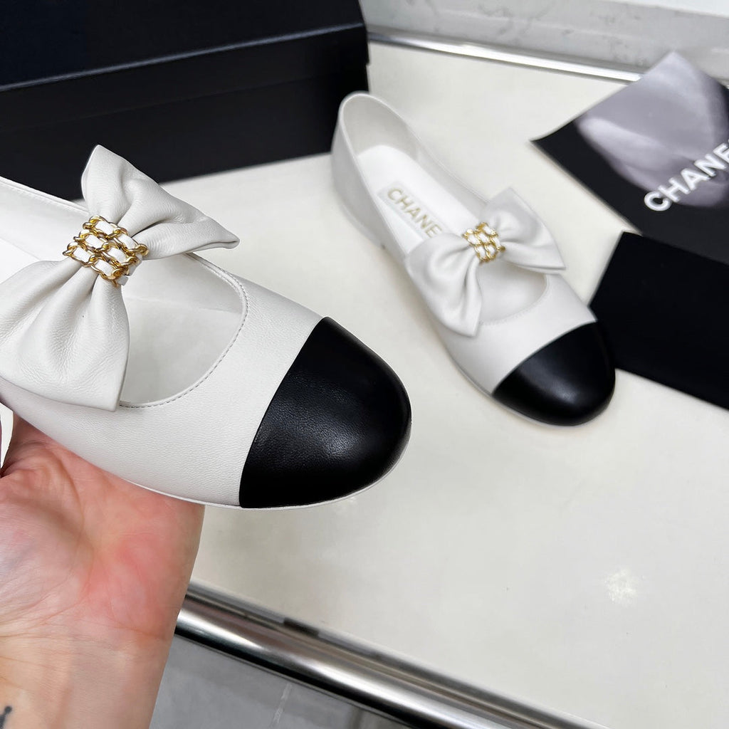 CHANEL 25S MARY JANES IN WHITE MIX BLACK CALFSKIN WITH BOW GOLD HARDWARE